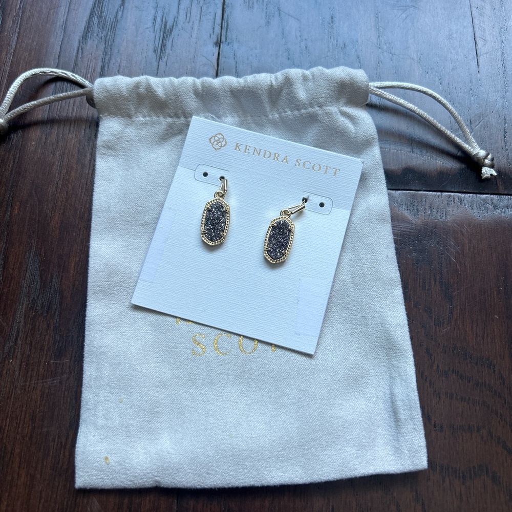 Gold Kendra Scott earrings with tags